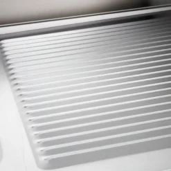 Spültisch Basic 10x7 mit 1 Becken links, Aufkantung und Grundboden